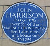 Blue plaque commemorating Harrison in Red Lion Square in London