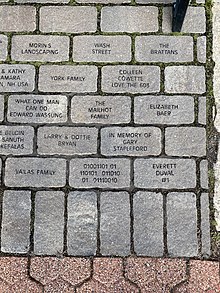 Memorial stones at Ralph Baer memorial including the stone with the binary inscription