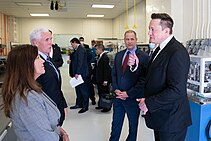 Musk converses with U.S. Vice President Mike Pence, the Second Lady, and other officials